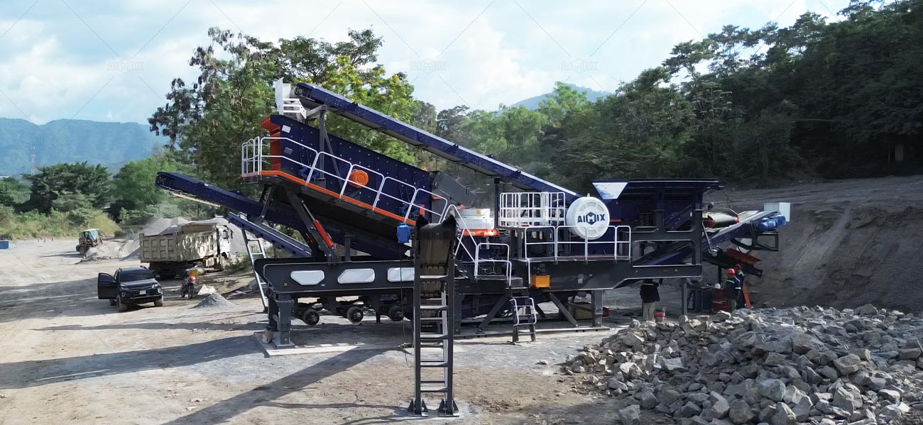 Trituradora de rocas móvil AIMIX, 80 toneladas/hora, para proyectos de producción de agregados en El Salvador.